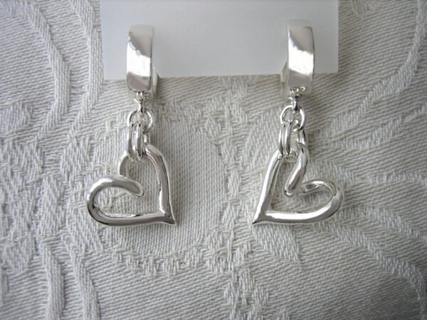 Hängande silverhjärtan - silversmycke i äkta silver - handgjorda silversmycken från Brokig silversmycken
